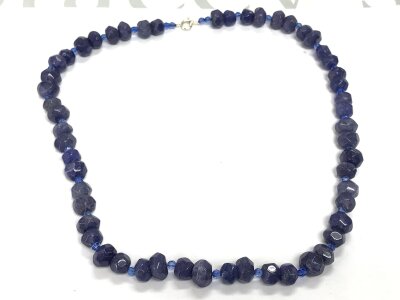 Necklace strung with polished reconstructed blue onyx beads. Approximately 330ct.