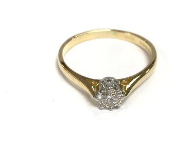 An 18ct gold diamond solitaire ring. Approx 0.35ct and size R
