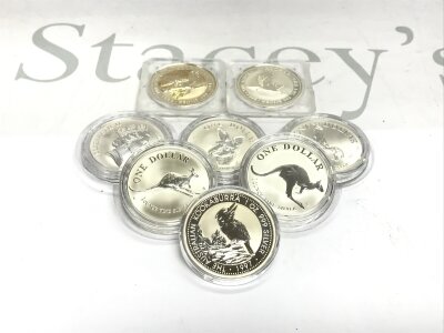 A collection of assorted 1oz silver coins including Kookaburras and Roos.