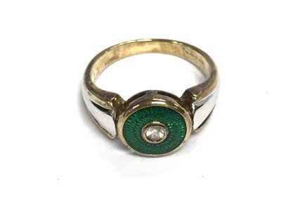A sterling silver and enamel stone set ring. Size K.