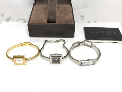 Three gucci ladies watches, one with a MOP dial.