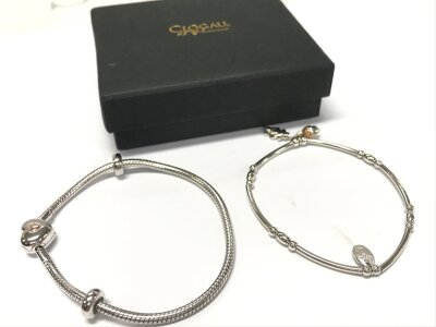 Two Ciogau sterling silver and gold bracelets, 20g total weight