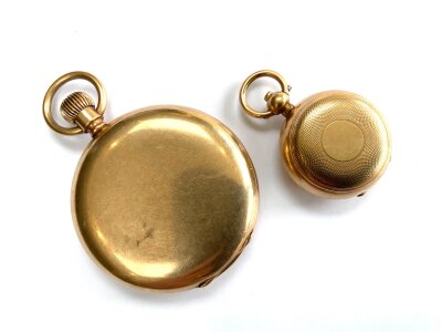 A gold plated pocket watch moth Omega movement together with a small gold plated sovereign case.