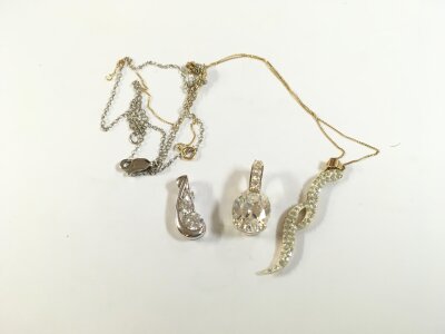 A 9ct pendant and necklace ,and a  silver necklace. Two silver pendants . Total weight 7.4g- NO RESERVE