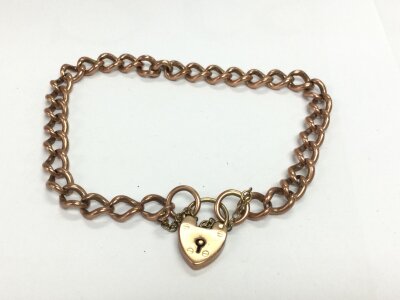 9ct gold bracelet with heart shaped padlock.
22.78g