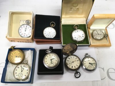 A collection of pocket watches including silver cased examples plus a Heuer stopwatch.