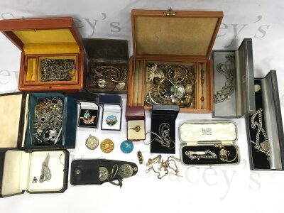 A collection of costume jewellery including a 9ct gold watch chain etc.