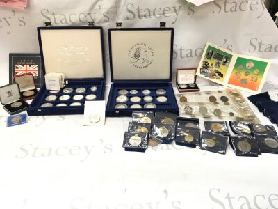 A collection of assorted silver and other coins including silver proof five pence set and a 1oz silver kangaroo dollar.