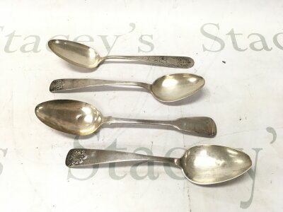 Four silver spoons approximately 175g total.