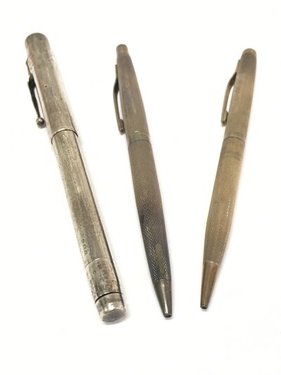 A vintage silver swan pen and two other silver hallmarked pens, 67g total weight.
