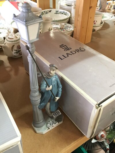 A Lladro Lamplighter boxed porcelain figure (47cm tall)