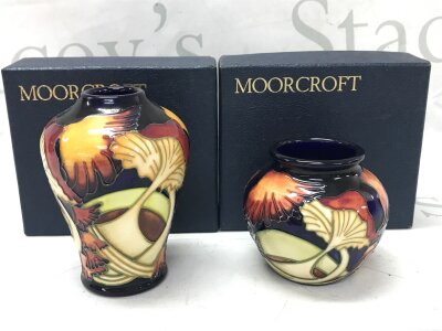 Two small Moorcroft Parasol Dance boxed vases . 8 and 11cm tall