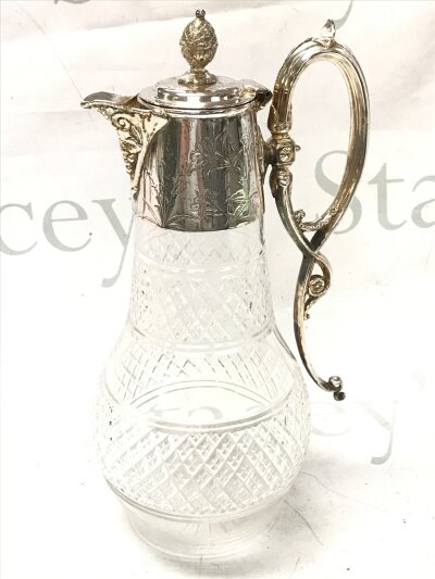 A Victorian silver plated jug, 28cm tall