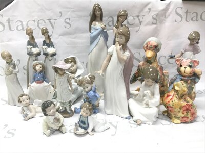 A Collection of porcelain Nao figures, also including three Joan Baker patchwork figures. Some damage .11 to 36cm tall