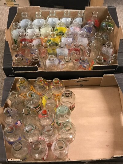 A large collection of vintage advertising milk bottles (52)