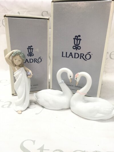 Two boxed Lladro porcelain figures, Endless Love swans figurine model 6585 Drifting Through Dreamland figurine model 6758. 13 and 18cm tall