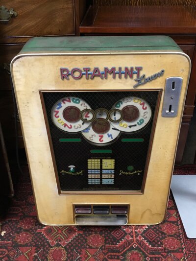 A vintage German Rotamint penny slot machine. Dimensions 70cm tall,50cm wide 18cm long