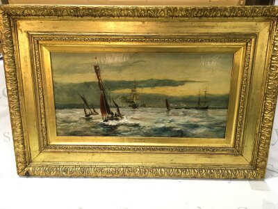 A gilt framed William Lionel Wyllie (1851-1931) maritime scene oil painting titled Near Rochester. Canvas size 59x29cm. Frame size 86x56cm