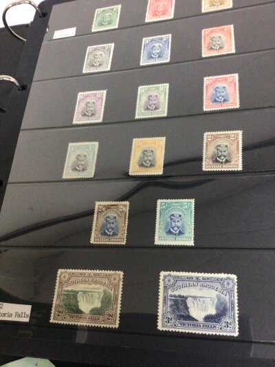 An album of Stamps Rhodesia British South Africa Southern and Northen Rhodesia from the late 19th century onwards a comprehensive well presented collection used and unused and including a rare block of four 1892 one pound stamps unused and other high values. Approximately 50 pages.