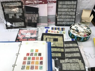 A large collection of world stamps both loose and in albums.- NO RESERVE