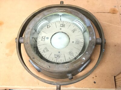 A boat compass , 26cm wide