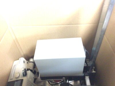 A Collection of Vintage Cameras in four boxes including a Vintage quarter plate camera Olympus OM10 Traveller Forth in a leather case other cameras cine cameras and developing equipment (4)