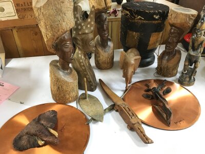 A collection of African carved hardwood including figures, wall masks, plaques , table etc- NO RESERVE