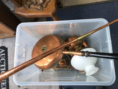 A copper warming pan and other copper ware