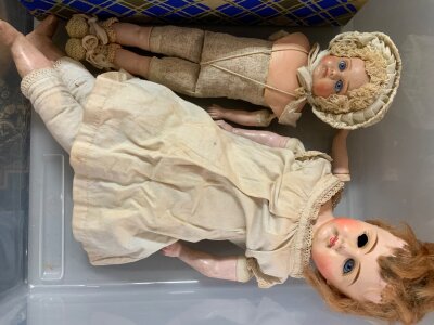 A collection of antique dolls to include Armand Marseille, various conditions.