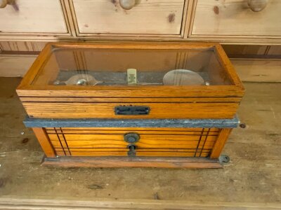 A vintage wooden case pharmacist scale, plus 2 additional scales.