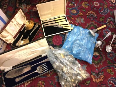 A collection of silver plated cutlery