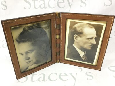 A vintage Hermes double folding leather travel picture frame with brass hinge.
19cm wide and 22cm when shut.