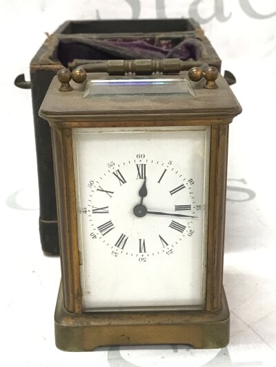 A cased carriage clock