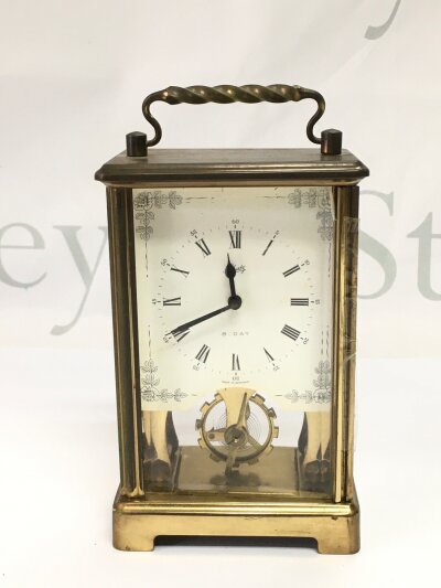 A brass cased 8 day carriage clock.