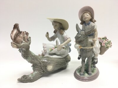 Two boxed Lladro figures girl riding Donkey 5465, Lady on tree 6140