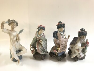 Three Lladro Geisha lady figures, one boxed and an extra figure