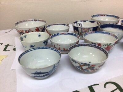 A collection of Worcester and other English 18th century tea bowls decorated in the Imari style and blue and white tea bowls in the Chinese Style.