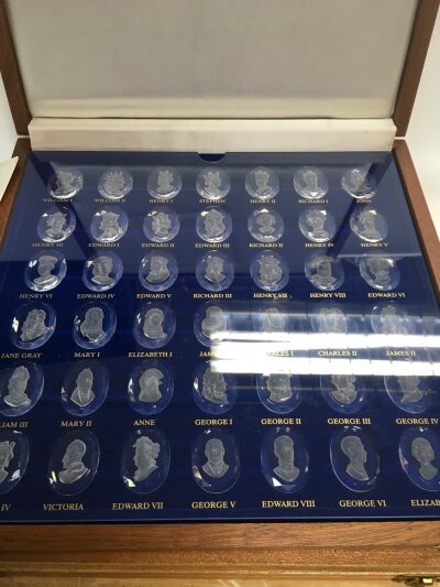 A mixed lot of two boxes of royal crystal cameos aswell as metal and crystal figures and other ceramics.