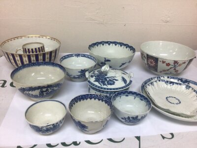 A collection of 18th century Worcester and other porcelain including  a butter  dish bowls included one decorated in a European taste with blue and gilt c1780  some hairline cracks.