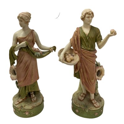 A pair of Royal Dux porcelain figural lamps bases, some restoration. 44cm