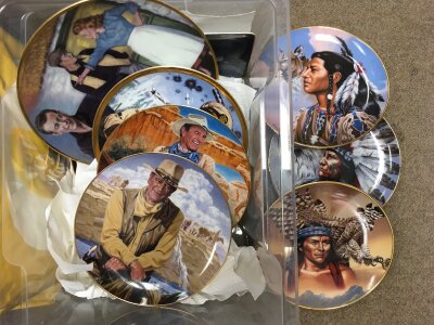 A collection of John Wayne and Wild West series plates, figures, trading cards etc.