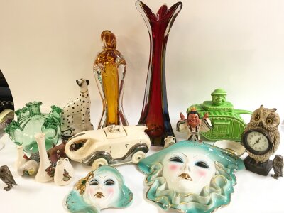 A collection of ceramics including novelty tea pots, art glass, Sampson smith dog figure, small royal Doulton Cassim figure, Masquerade porcelain wall masks