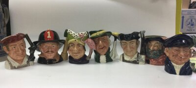 7 large toby jugs featuring : lobster man, the fireman,sir John falstaff, ugly duchess, regency beau,gunsmith, blacksmith. A great collectors item.