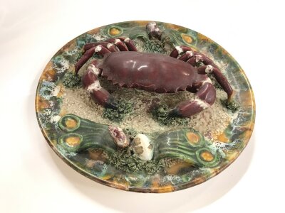 A Palissy plate decorated with a raised crab ,marks to the base F.MENDES LDA PORTUGAL. 30cm wide