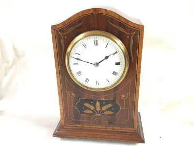An Edwardian mantle clock. 23cm tall 17cm wide NO RESERVE