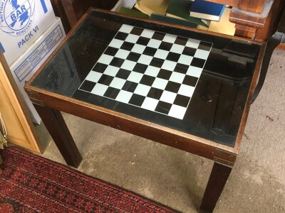 Games table with games pieces under top. 50cm tall ,61cm wid