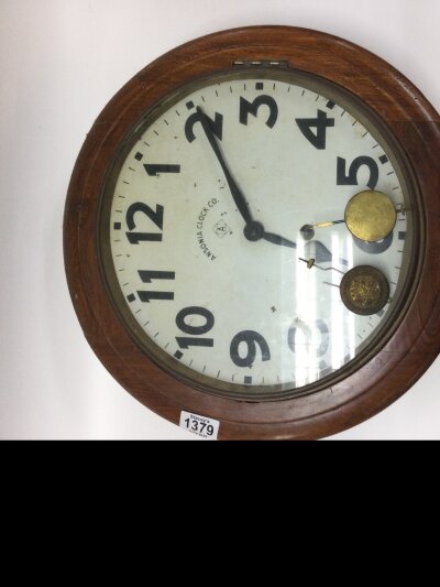Ansonia clock.Co antique wall clock schoolhouse/office/railway station style, dating 1890s-1920s with a solid oak case