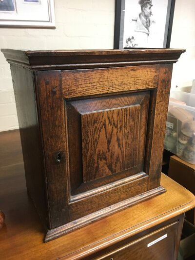 A 19th Century oak vernacular hanging cabinet with a fitted interior, approx 41cm x 45cm x 25cm.