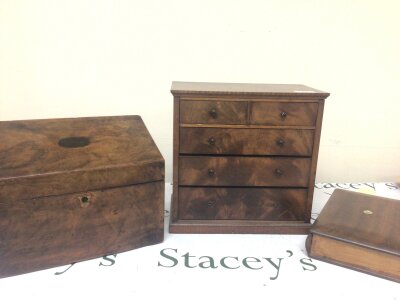 A small mahogany apprentice type chest of drawers with two short and three long drawers a Victorian walnut stationary box and a mahogany box (3)
