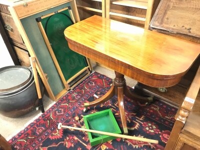 A fold over card table and a collection of games boards. 72cm tall , 91cm wide, 46cm deep